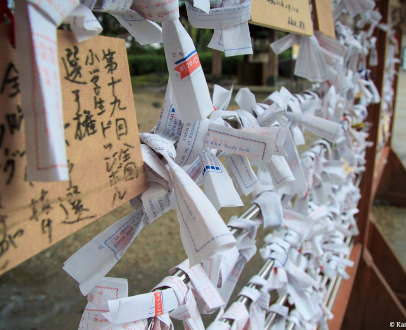 Zojo-ji in Tokyo, Ema votive plates and omikuji paper slips Zojo-ji in Tokyo, Ema votive plates and omikuji paper slips