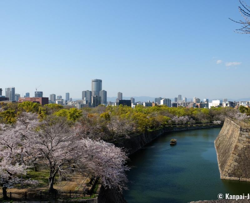 Osaka Castle (Kansai), View on the blooming cherry trees and the moats Osaka Castle (Kansai), View on the blooming cherry trees and the moats